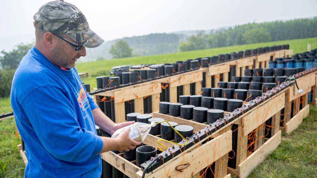 Dave Benign of Starfire Corporation shows one of the firework shells prepped for the Central PA 4th Fest fireworks show on Friday, June 30, 2023.