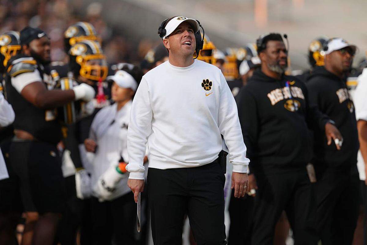 Head coach Eli Drinkwitz of the Missouri Tigers watches a review on the board against the Texas A&M Aggies  in the first half at Faurot Field at Memorial Stadium on November 08, 2025 in Columbia, Missouri. 