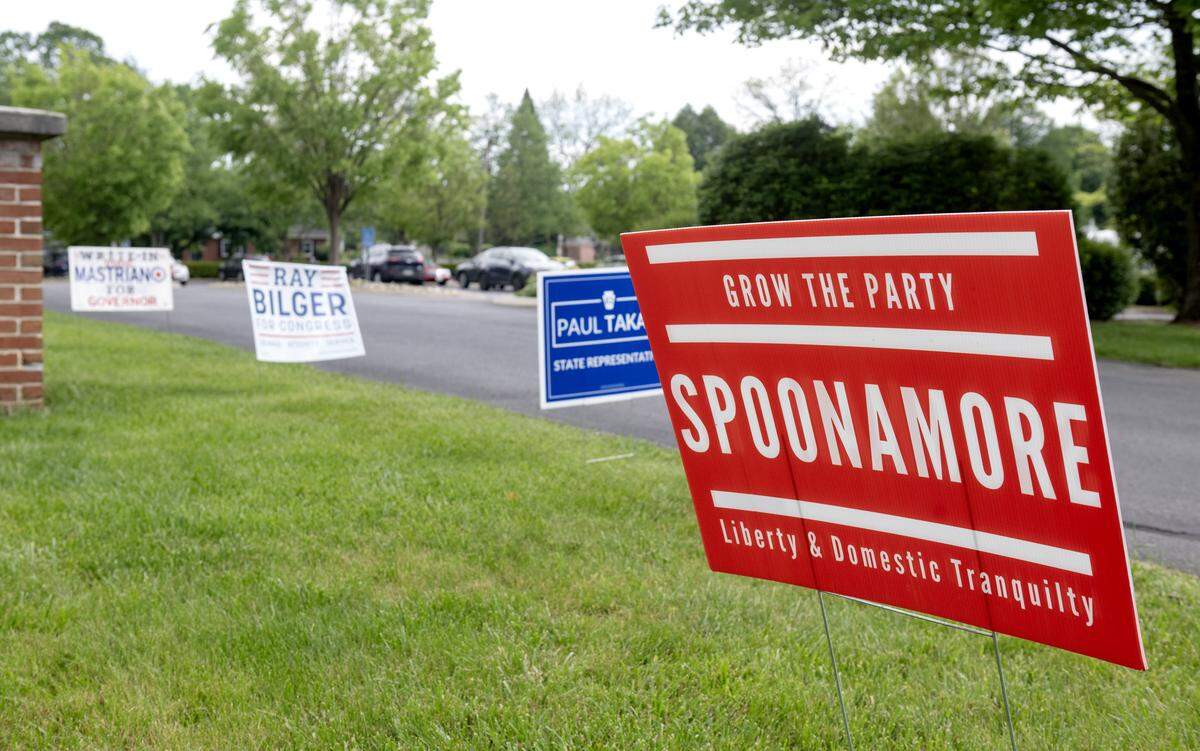 Signs for candidates including Stephen Spoonamore are pictured outside Precinct 43 on Primary Election Day on Tuesday, May 19, 2026.  