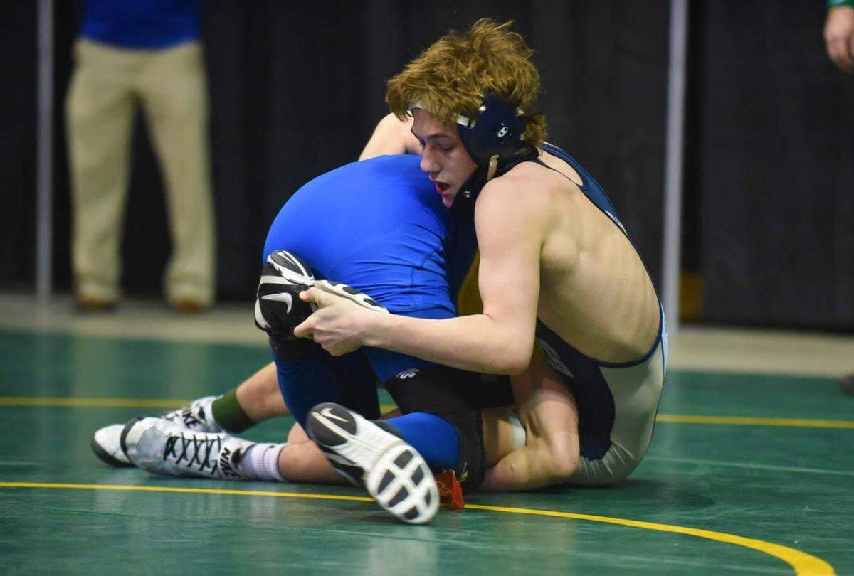 Bald Eagle Area’s Cooper Gilham looks to escape Chestnut Ridge’s Ross Dull in their 126-pound consolation finals bout during the PIAA Class 2A Southwest Regional tournament on Saturday at Indiana University of Pennsylvania. Dull pinned Gilham in 2:03 to send the Eagles’ wrestler to a fourth-place finish.