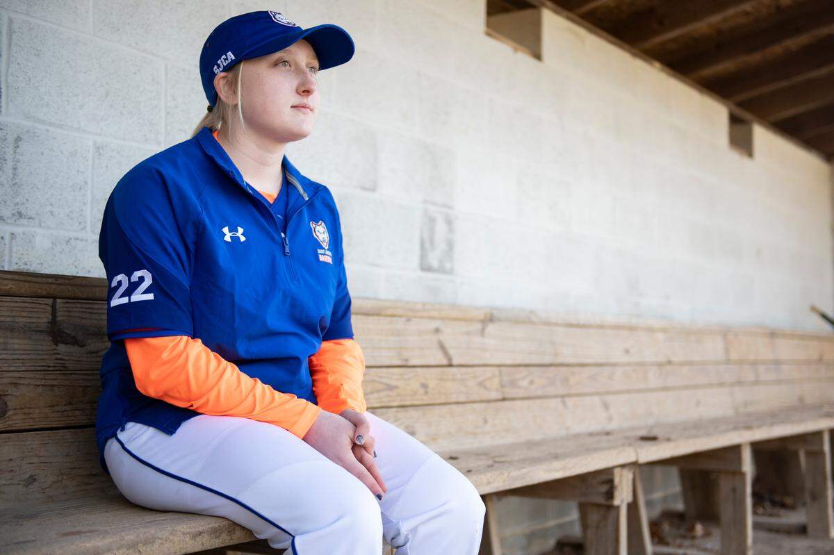 Saint Joseph’s Katie Pase poses for a photo Wednesday after a baseball game between Penns Valley and Saint Joseph’s Catholic Academy. After St. Joseph’s canceled the softball season Pase joined the baseball team to continue to play.