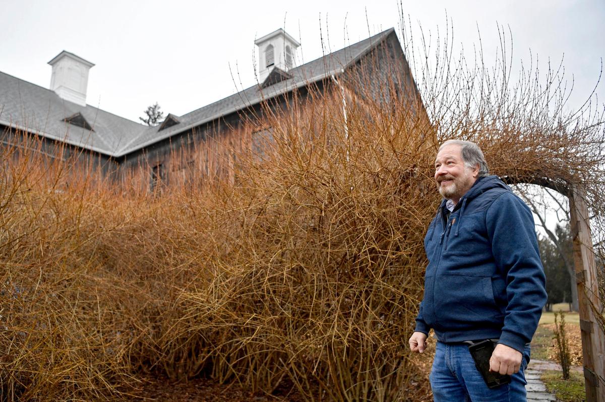 Columbus Chapel and Boal Mansion museum director Bob Cameron shows the Shakespeare secret garden outside of the Boal Barn Playhouse on Feb. 18, 2020.