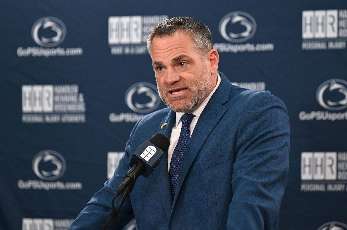 Penn State athletic director Pat Kraft introduces the new Lady Lions coach Tanisha Wright during a  press conference on Monday, March 23, 2026.  