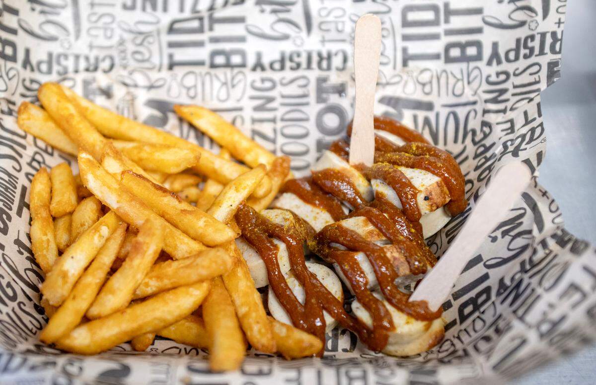 Currywurst, fresh German bratwurst topped with housemate curry ketchup and served with fries from Dubbs Grub on Friday, Jan. 17, 2025.