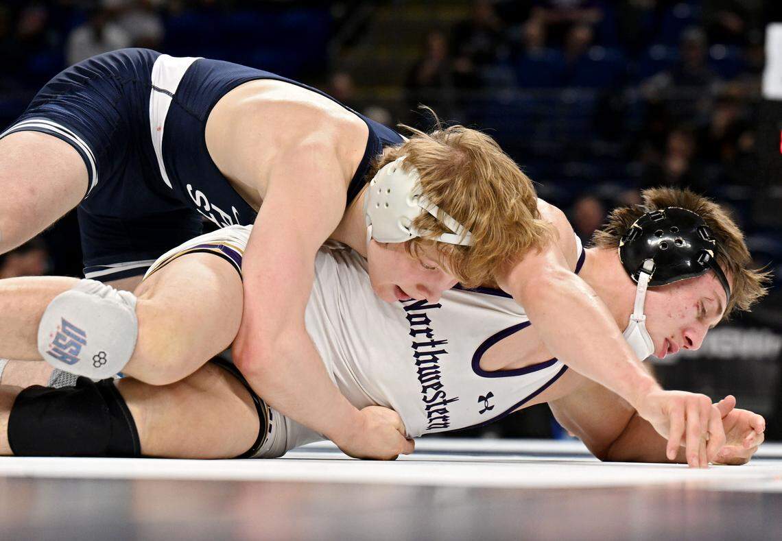 Penn State's Braeden Davis controls Northwestern’s Billy DeKraker during the 141-pound bout during the Big Ten wrestling championships at the Bryce Jordan Center on Sunday, March 8, 2026.