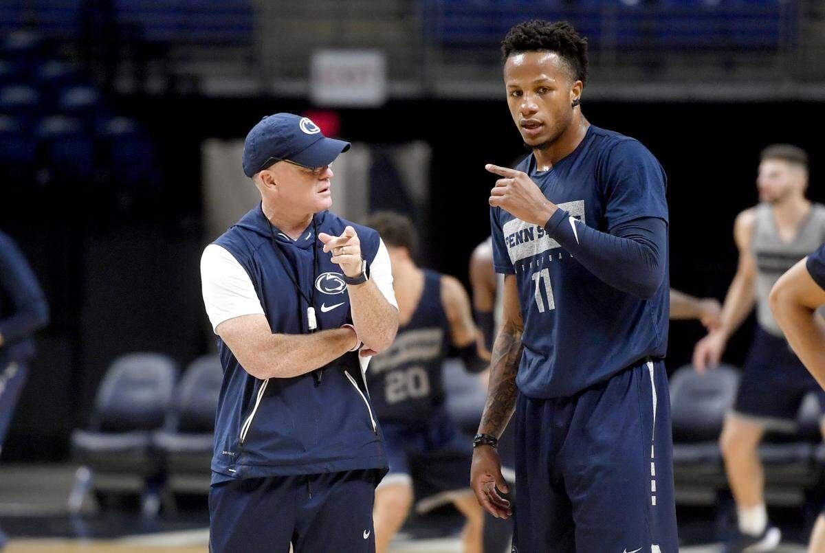 Penn State basketball coach Pat Chambers talks with Lamar Stevens during Penn State men’s basketball practice on Monday, Oct. 7, 2019.