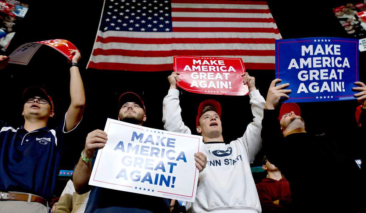 Penn State students cheer for Donald Trump during his rally at the Bryce Jordan Center on Saturday, Oct. 26, 2024.