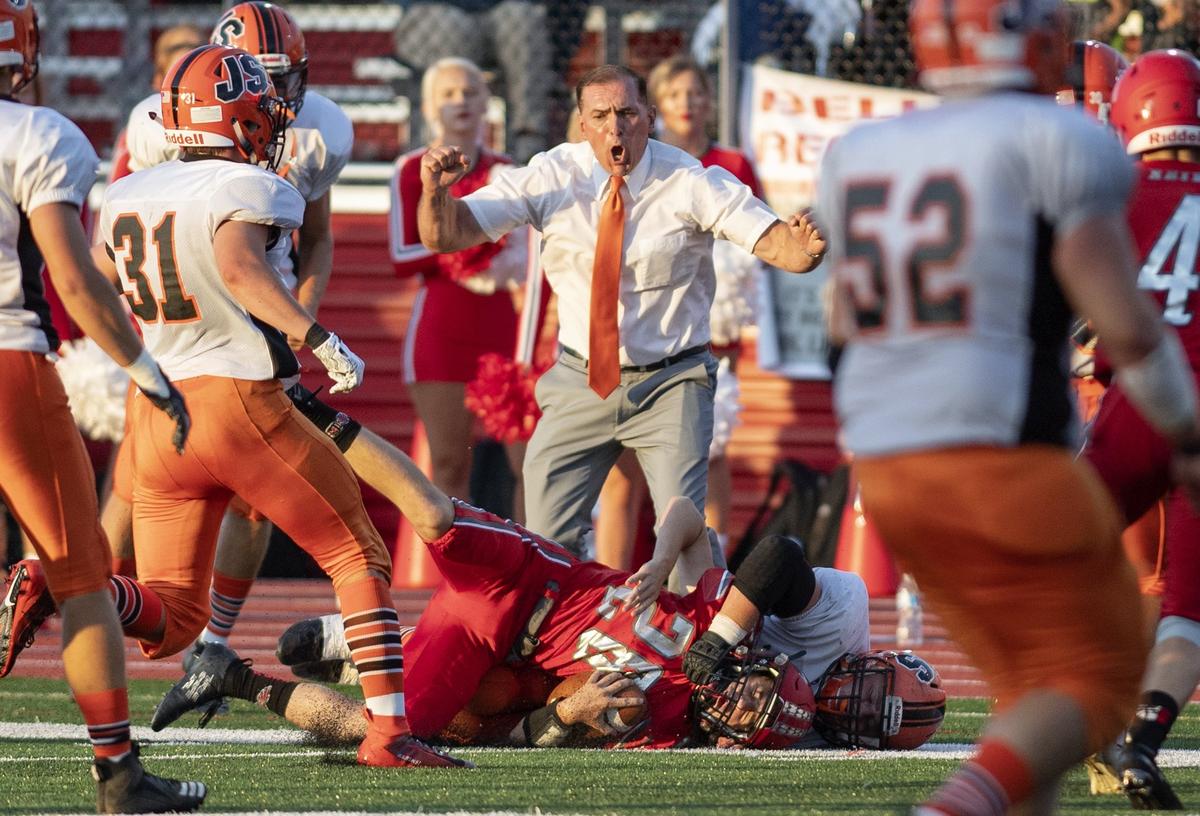 Jersey Shore football coach Tom Gravish cheers as one of his players tackles Bellefonte’s ball carrier during the game on Friday, August 23, 2019 at Rogers Stadium.