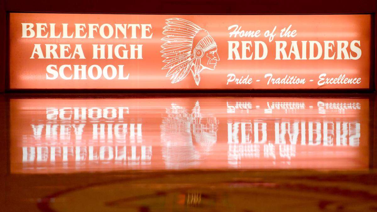 The scores table at the Bellefonte Area High School gym says home of the Red Raiders, and the red raider logo is painted at center court.