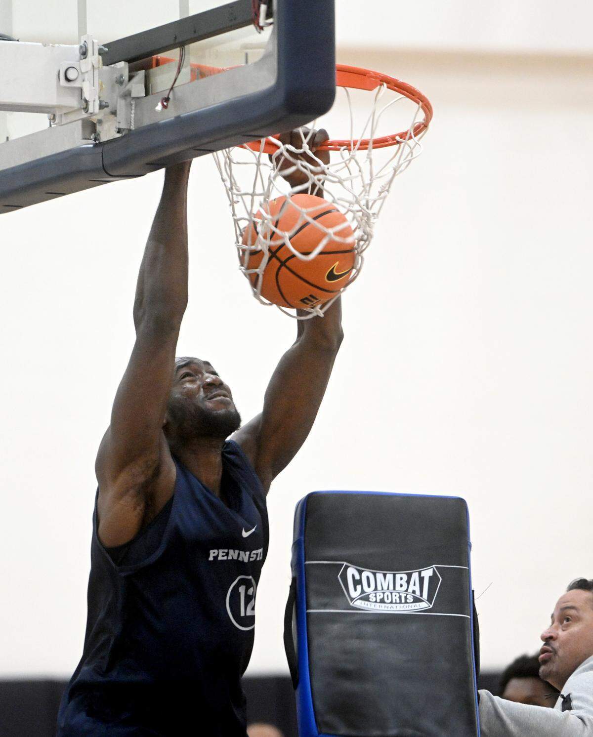 Penn State’s Favour Aire dunks during a men’s basketball summer workout on Tuesday, July 11, 2023.