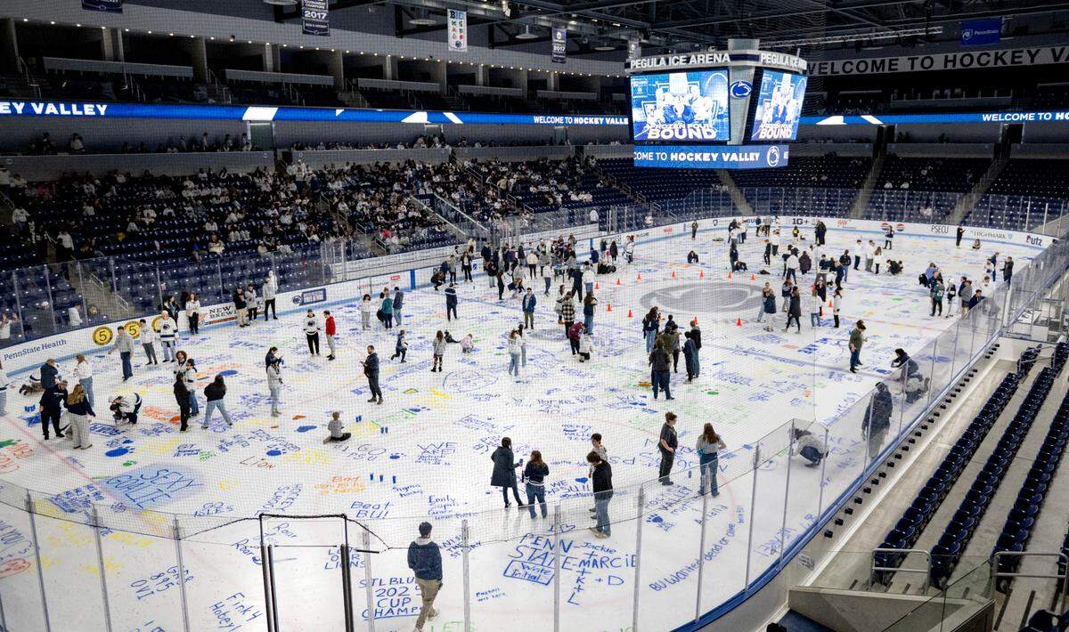 Penn State fans paint the ice at Pegula Ice Arena as they wait to to watch the Nittany Lions in the NCAA Men’s Frozen Four semifinal game on Thursday, April 10, 2025.  