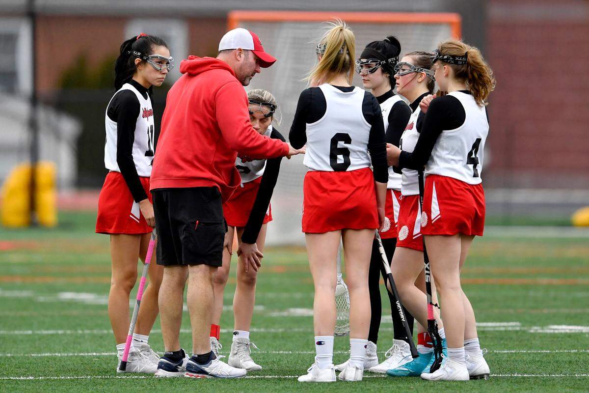 Bellefonte girls lacrosse coach Doug McKee talks to his players during the game against Selinsgrove on Tuesday.