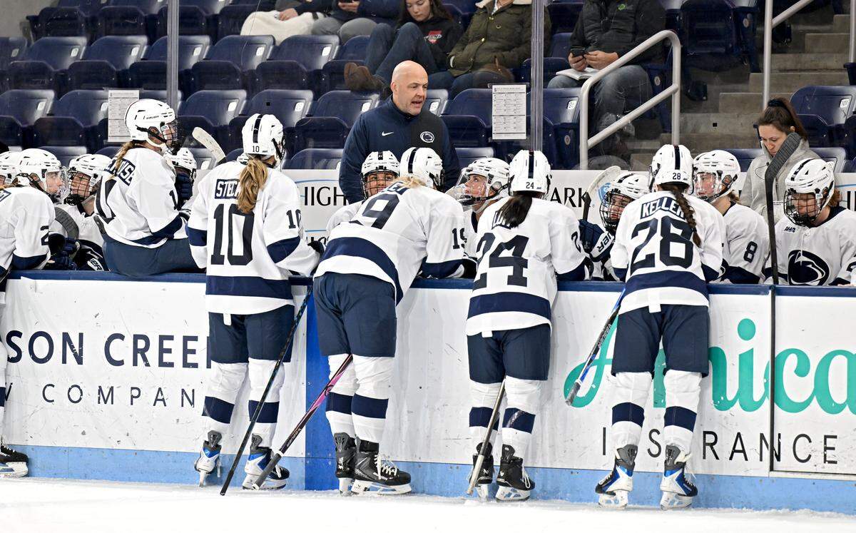 Penn State women’s hockey coach Jeff Kampersal talks to his players during the game against Syracuse on Friday, Nov. 14, 2025 at Pegula Ice Arena. Penn State won, 7-0.  