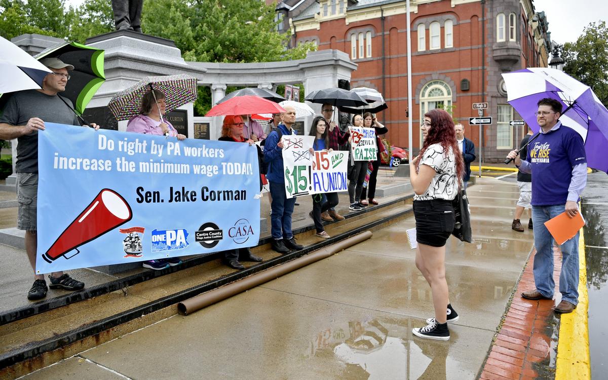 Robin Moussa from the Centre County Wage Justice Coalition shares her story of being a full-time student and working until the early hours of the morning just to make ends meet on Monday during the Raise the Wage rally outside of the Centre County Courthouse.