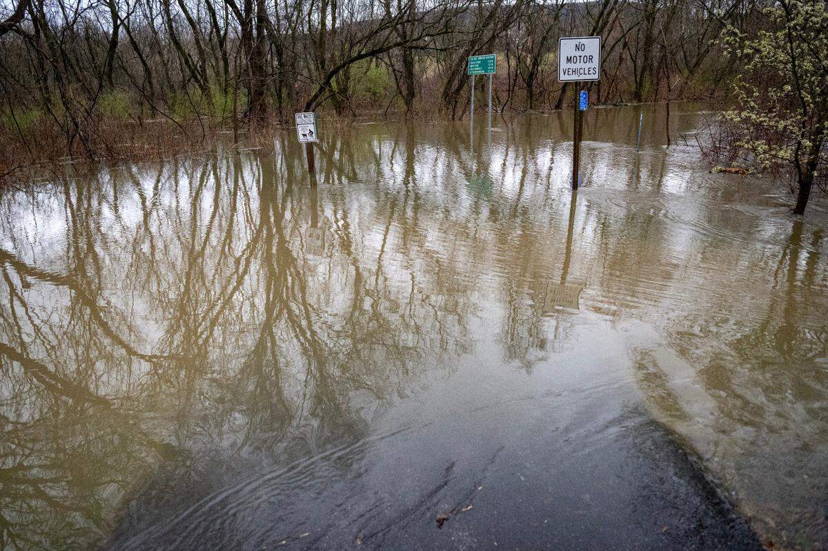 A portion of the College Township bike path near Puddington Road is flooded on Wednesday, April 3, 2024.