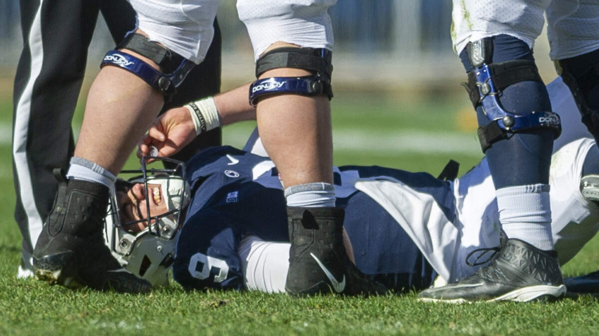 Penn State quarterback Trace McSorley (9) grimaces in pain after being sacked during the game against Wisconsin at Beaver Stadium on Saturday, Nov. 10, 2018.