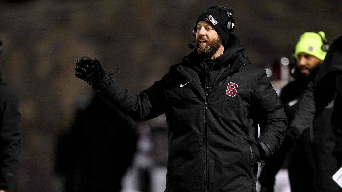 State College football coach Matt Lintal motions to his players during the game against McDowell on Friday, Nov. 18, 2022.