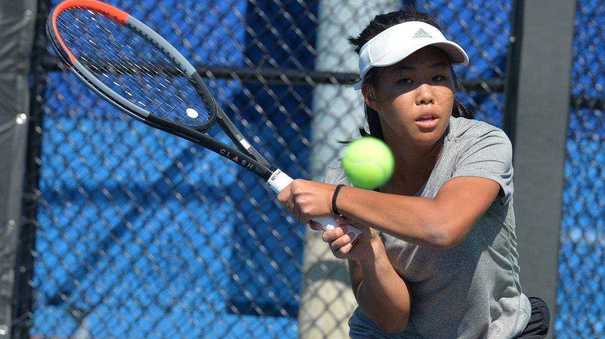 State College High School’s Quiana Guo competes against Hollidaysburg’s Gretta Rhodes for the District 6 AAA Singles championship on Wednesday, Sept. 21, 2021, at Altoona Area High School’s Mansion Park courts.
