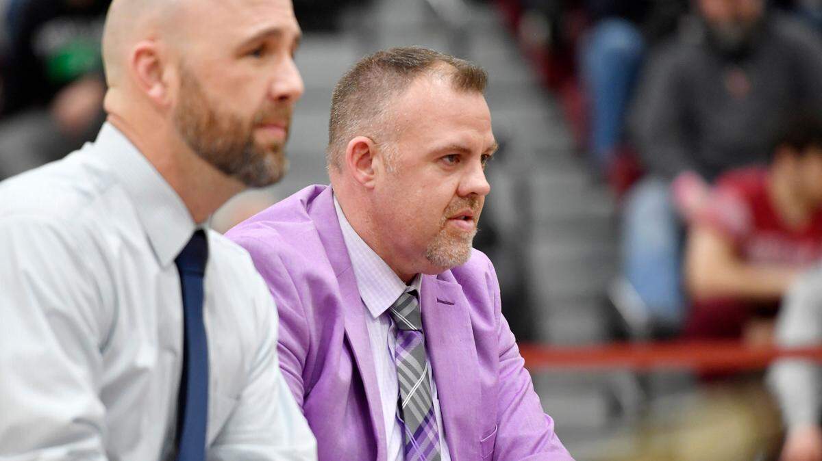 Philipsburg-Osceola wrestling coach Justin Fye watches his team during the District 6 2A tournament on Saturday, Feb. 19, 2022.