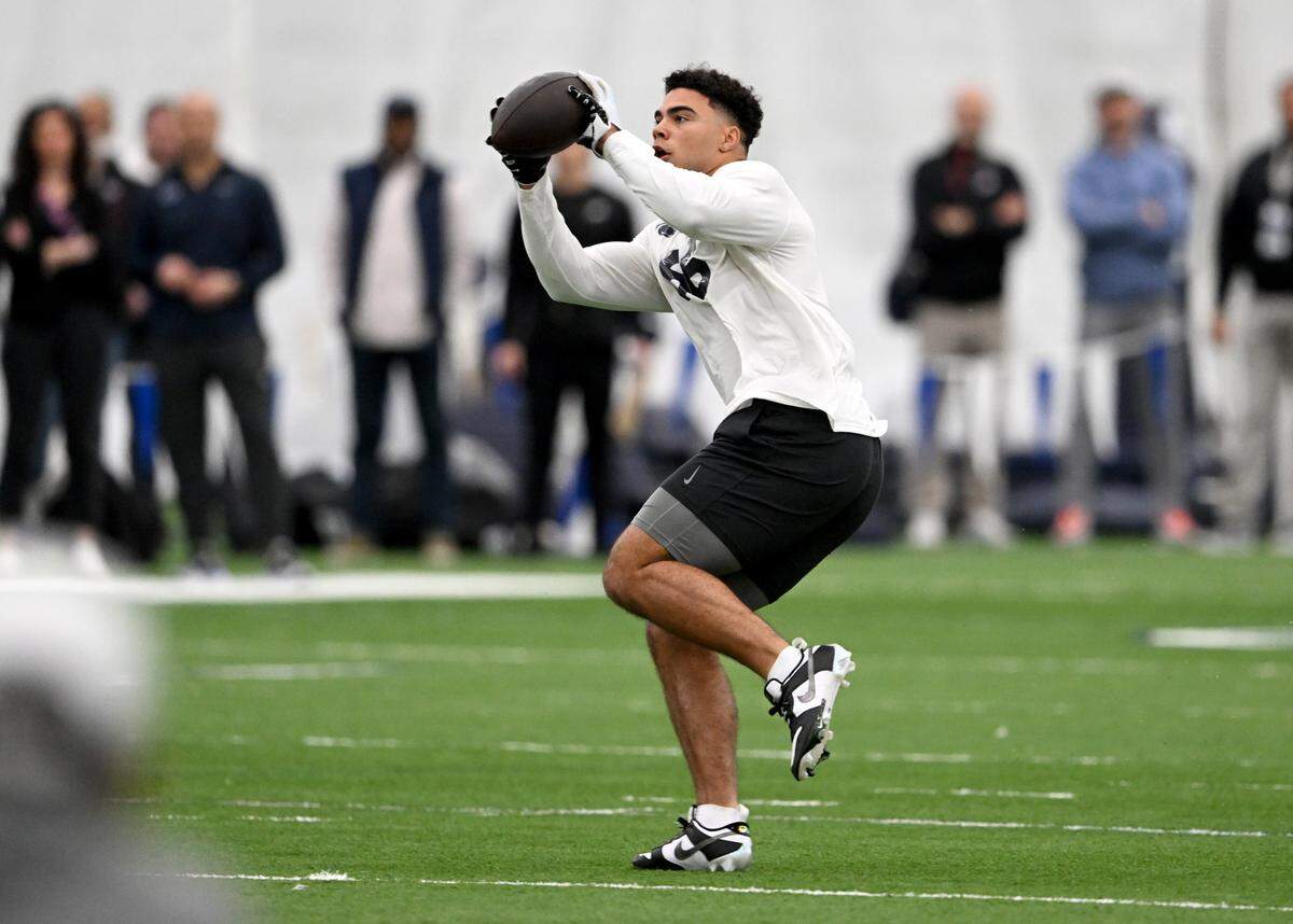 Tight end Brenton Strange runs a position drill during Penn State football’s Pro Day on Friday, March 24, 2023.