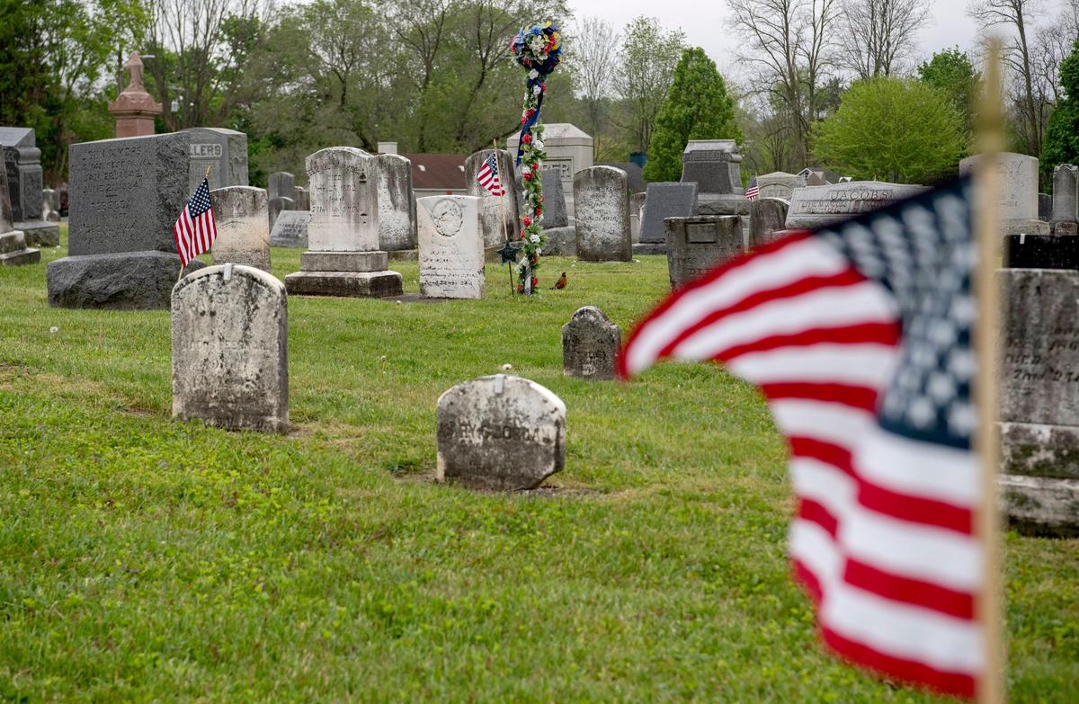 Flags wave in the wind at the Boalsburg cemetery on Friday, May 22, 2020. Numerous events will be held this weekend in Centre County in honor of Memorial Day.