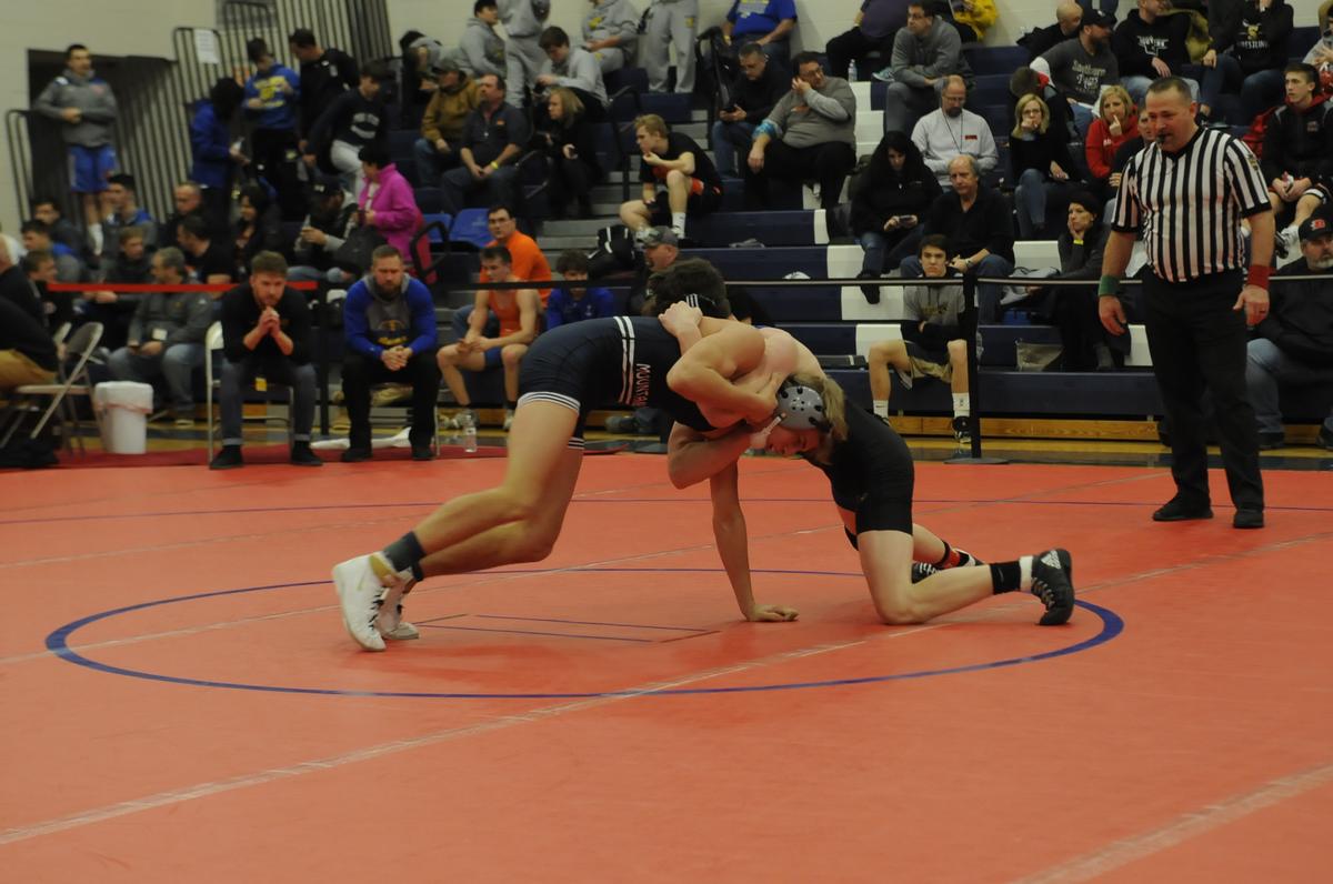 Philipsburg-Osceola’s Hunter Weitoish avoids being taken down by Johnsonburg’s Cole Casilio during their 152-pound quarterfinals match of the Ultimate Warrior Tournament at West Branch High School in Allport on Friday, January 25, 2019. Casilio topped Weitoish 2-1.