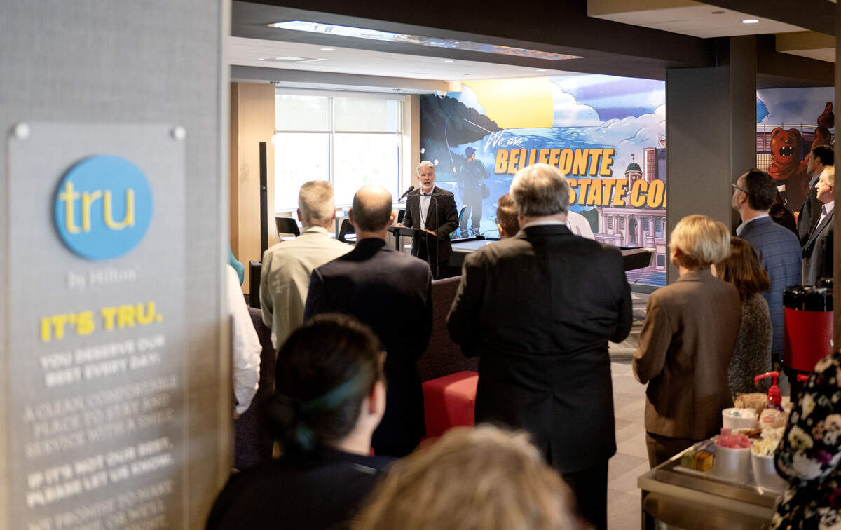 People gather in the lobby of the Tru Hotel by Hilton on Benner Pike to listen to Greg Scott from the CBICC on Wednesday, April 22, 2026.  