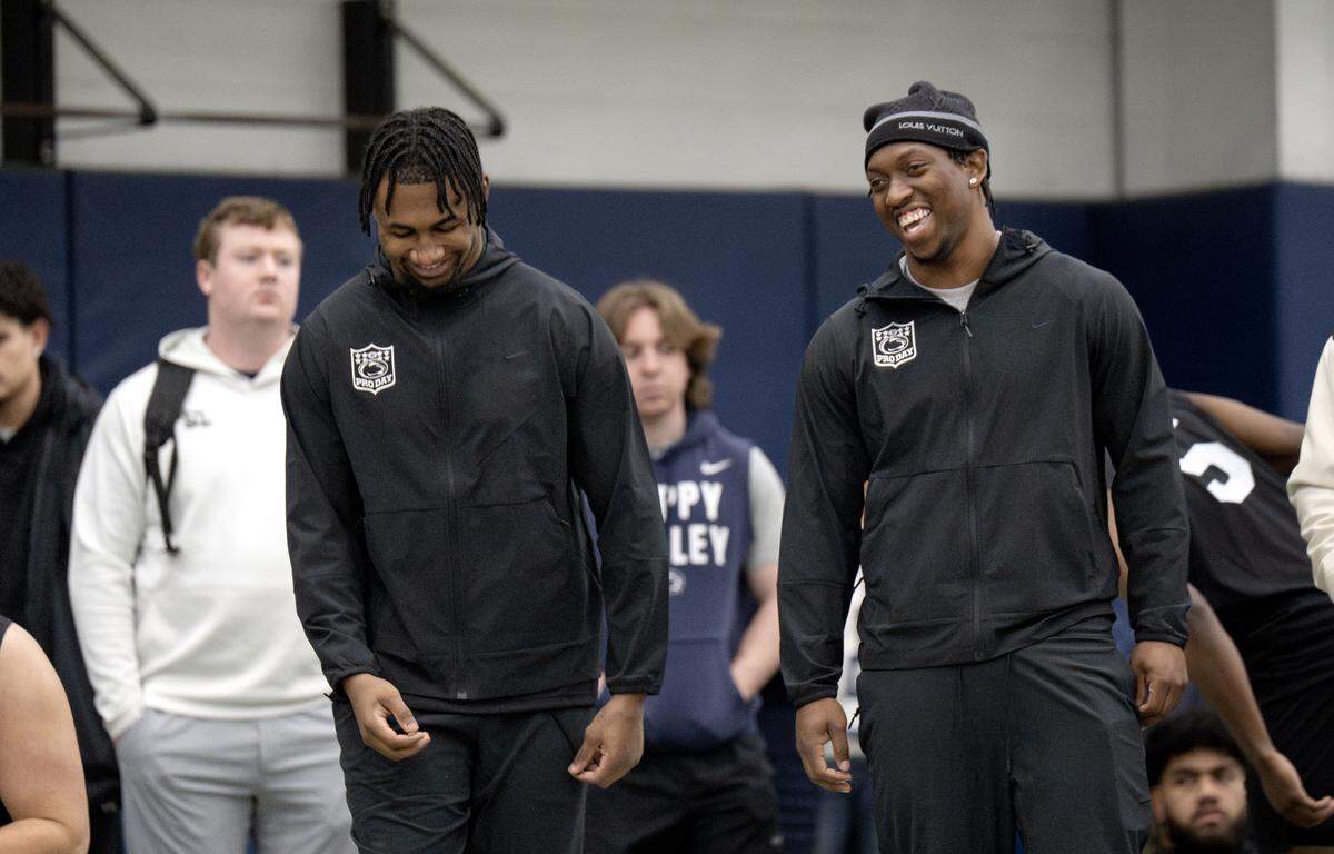 Running backs Nick Singleton and Kaytron Allen laugh together during Penn State Pro Day on Wednesday, March 18, 2026.  