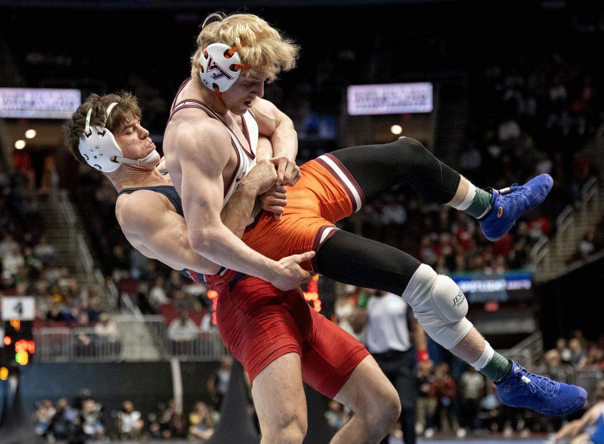 Penn’s Jude Swisher, who is a Bellefonte alum, controls Virginia Tech’s Ethen Miller in a 157-pound consolation bout at the NCAA Wrestling Championships on Friday, March 20, 2026.