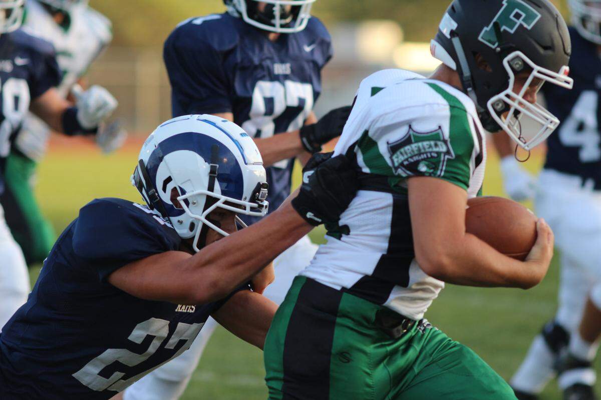 Penns Valley’s Austin Fisher attempts a tackle against Fairfield on Friday.