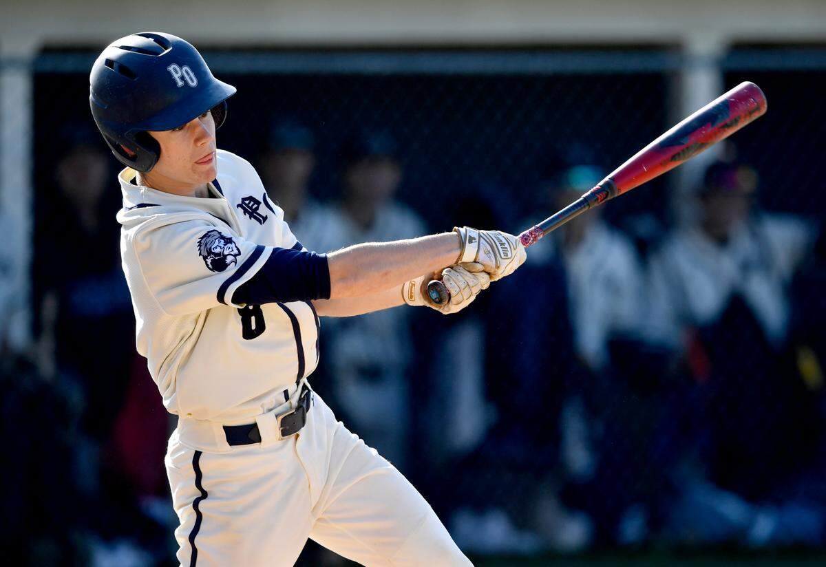 Philipsburg-Osceola’s Ben Gustkey hits a single that scores a run during the baseball game against Bald Eagle Area on Thursday, April 28, 2022.