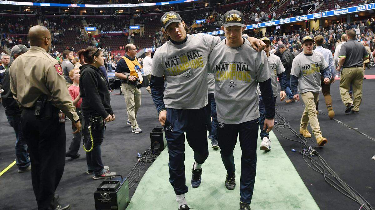 Penn State’s Bo Nickal, right, and Shakur Rasheed walk away from the mat after the finals in the NCAA Division I Wrestling Championships Saturday, March, 17, 2018 at the Quicken Loans Arena in Cleveland, Ohio. According to Penn State’s updated roster for this coming season, the two are flip-flopping weight classes.