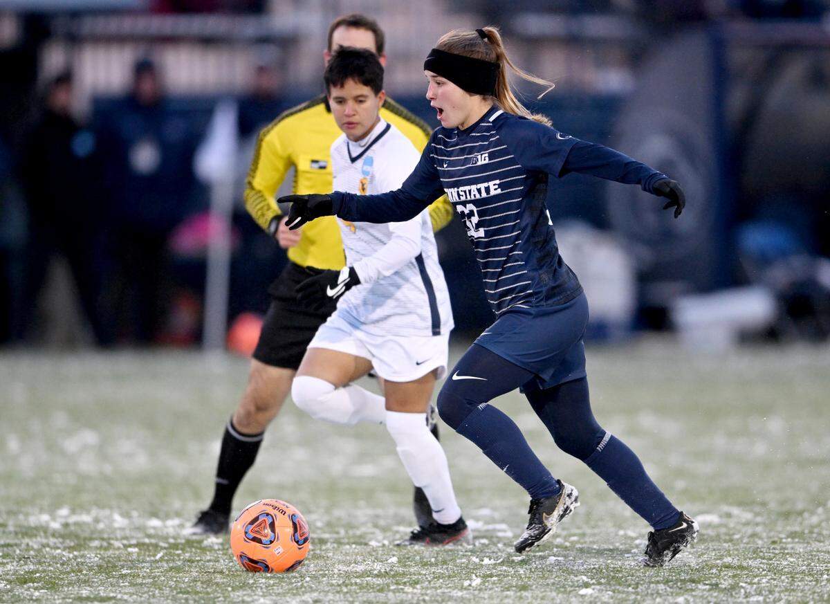 Penn State women’s soccer’s Natalie Wilson runs down the field with the ball during the game against West Virginia in the second round of the NCAA championships on Friday, Nov. 18, 2022, at Jeffrey Field.