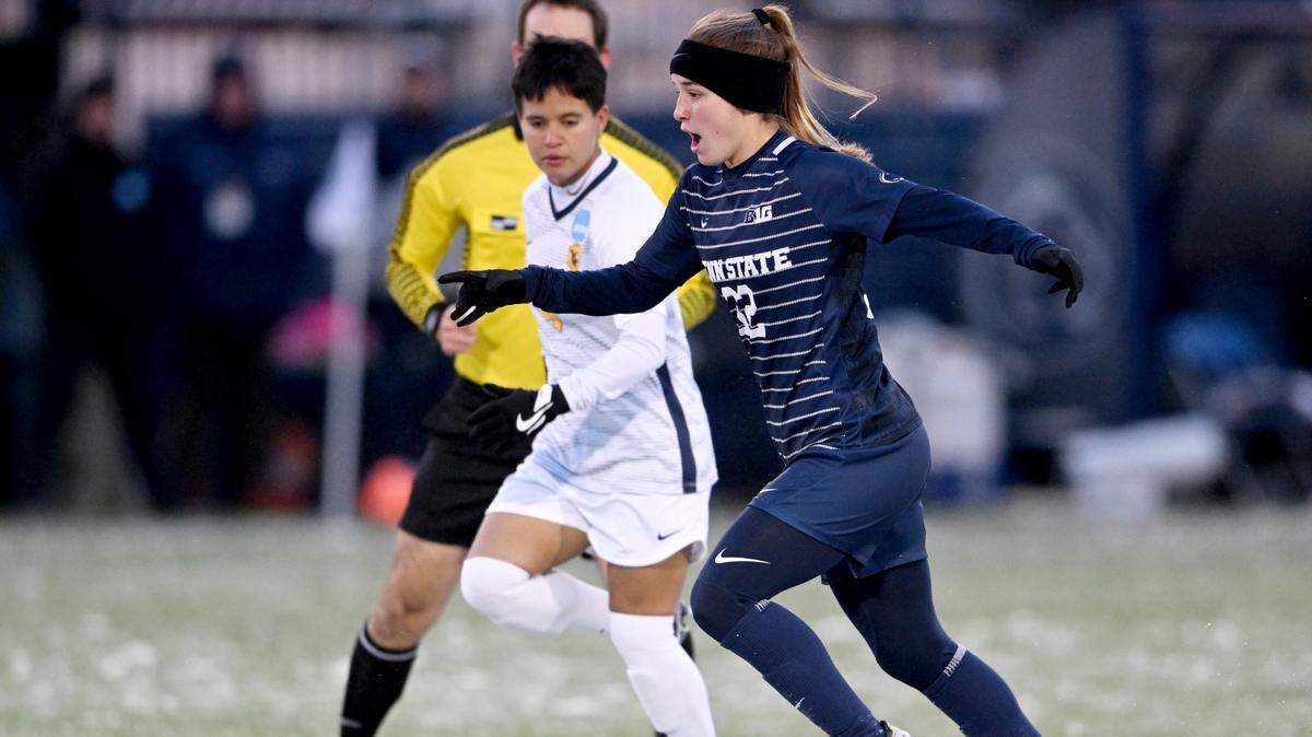 Penn State women’s soccer’s Natalie Wilson runs down the field with the ball during the game against West Virginia in the second round of the NCAA championships on Friday, Nov. 18, 2022, at Jeffrey Field.