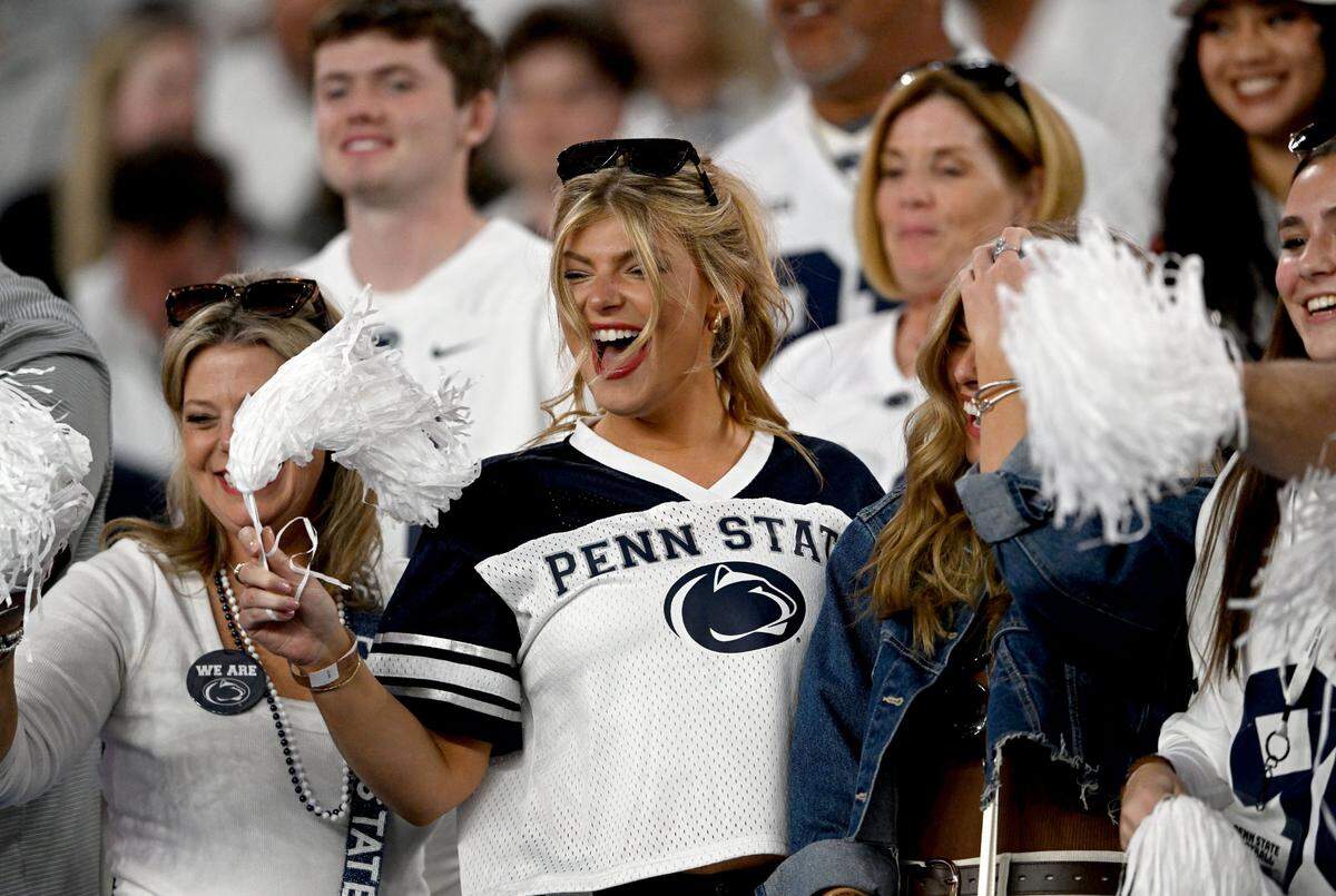 Penn State fans cheer as the team warms up for the Fiesta Bowl against Boise State at State Farm Stadium on Tuesday, Dec. 31, 2024.