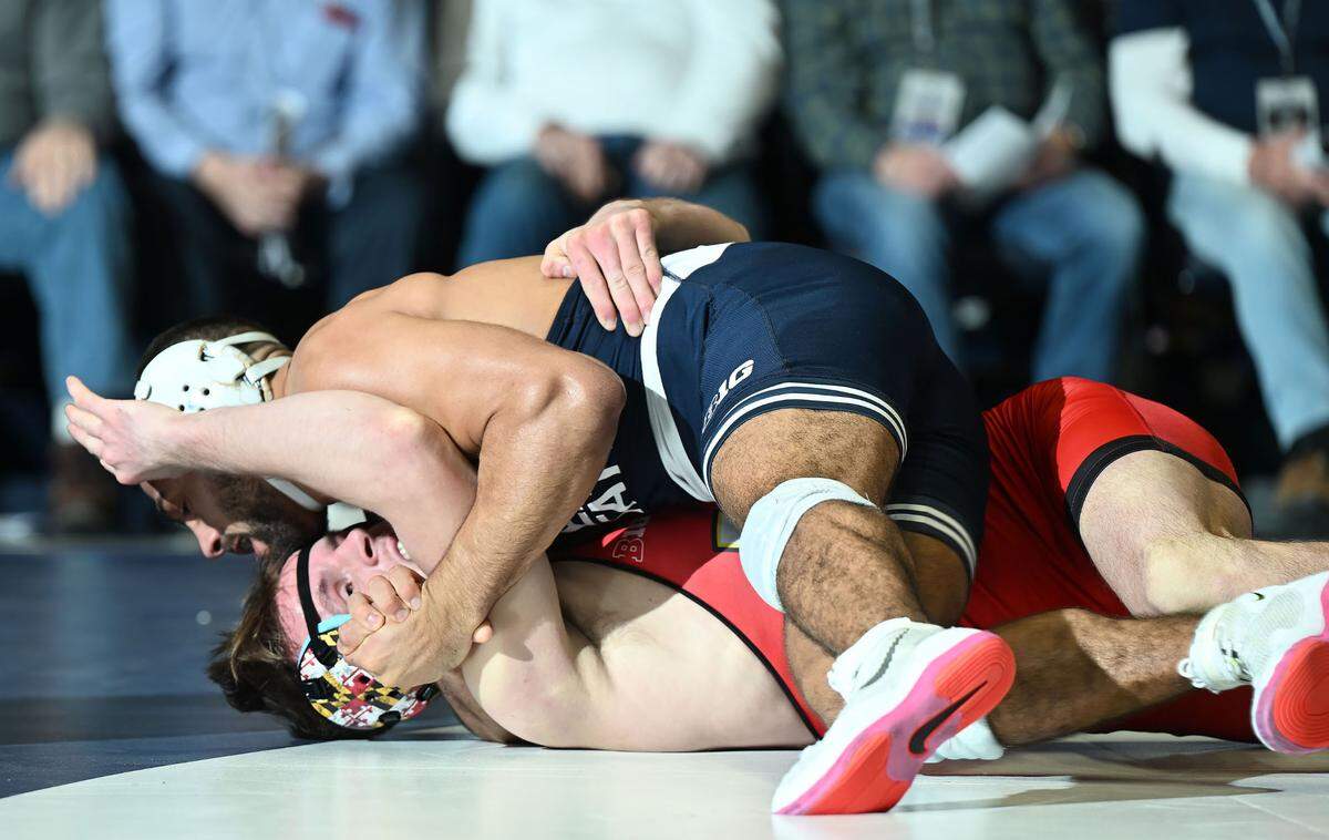 Penn State’s Shayne Van Ness scores a near-fall over Maryland’s Kal Miller at 149 lbs. during Sunday’s meeting at Rec Hall in State College. Van Ness defeated Miller, 17-2.