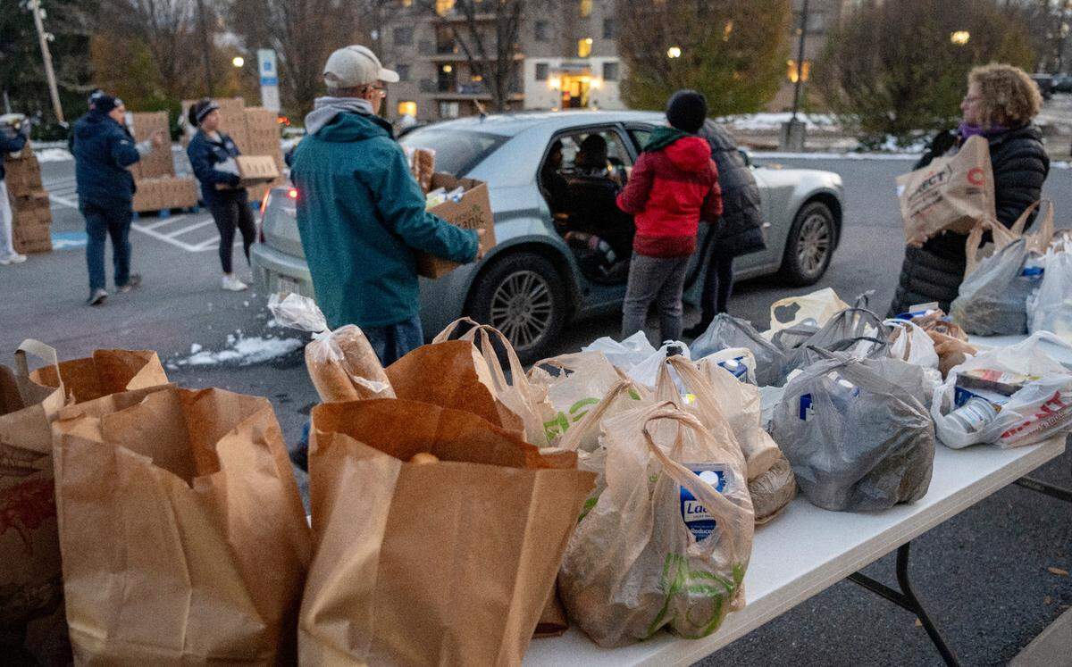 Bags of food to be loaded into cars at the YMCA Anti Hunger Program’s distribution at the Grace Lutheran Church in State College on Thursday, Nov. 17, 2022.