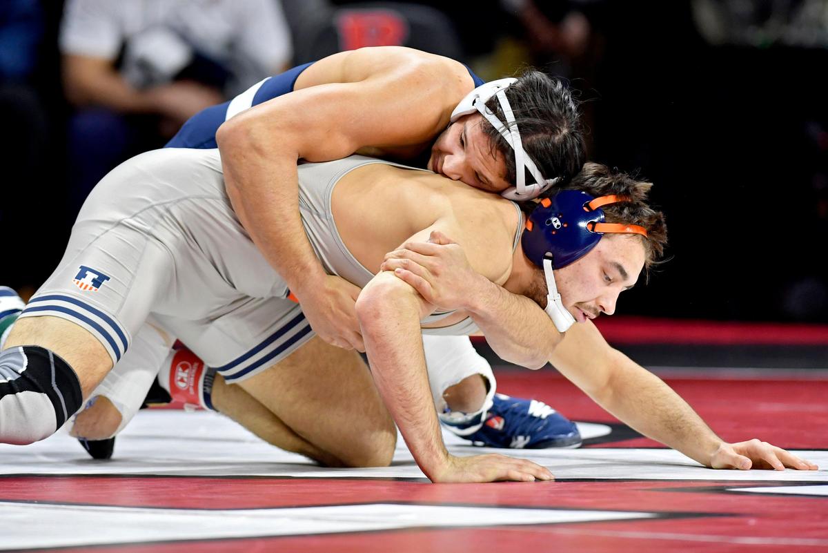 Penn State’s Shakur Rasheed controls Illinois’ Matt Wroblewski in the first round of the Big Ten Wrestling championships at Rutgers on Saturday, March, 7, 2020. Rasheed won by fall.