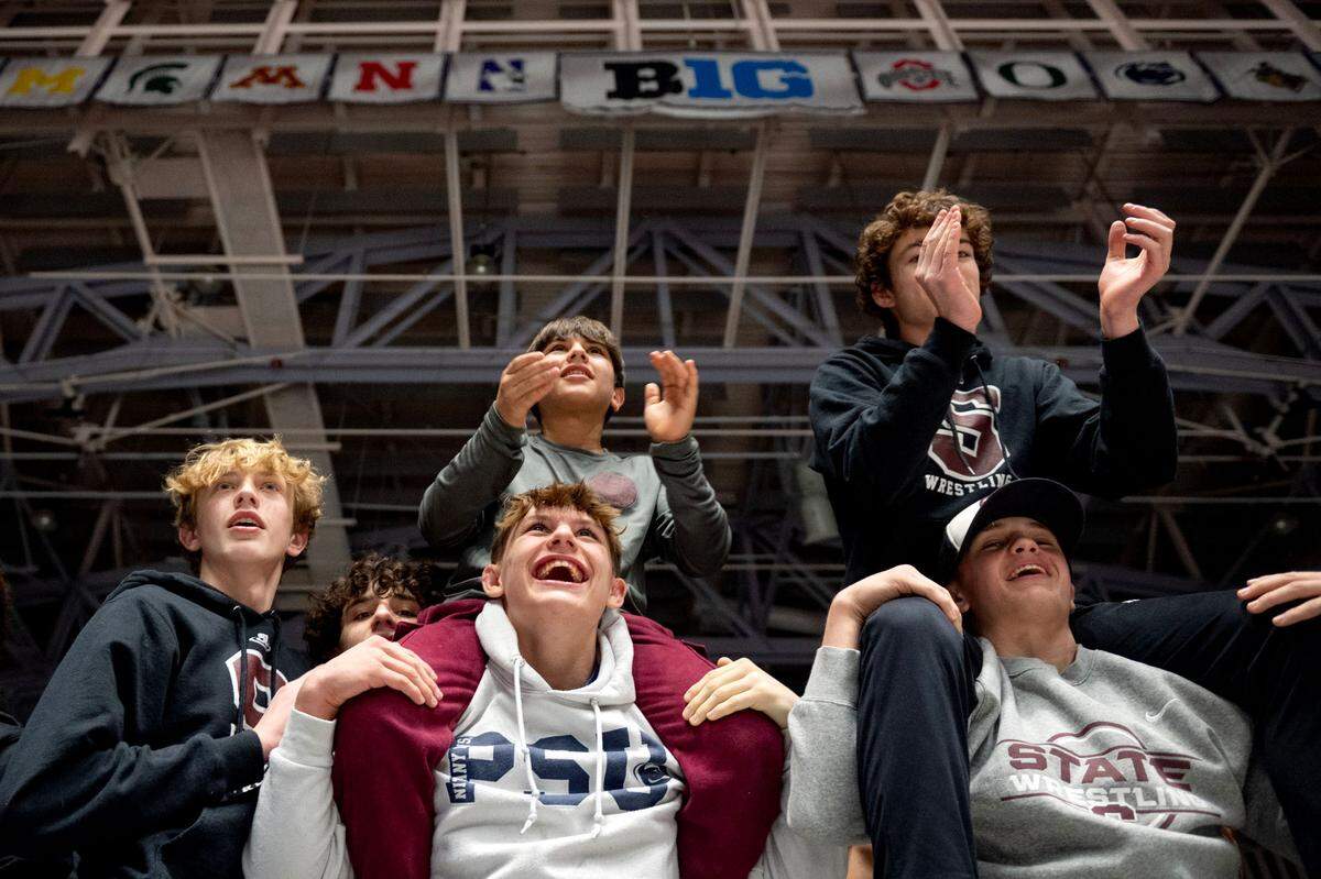 Young fans cheer as the Penn State wrestling team is introduced for their match against Michigan State on Friday, Jan. 10, 2025 in Rec Hall.