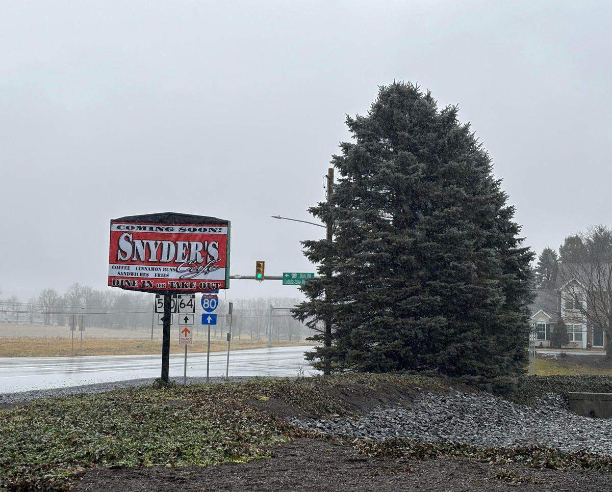A sign for Snyder’s Cafe, located at the corner of Zion Road and College Avenue in Zion, PA.
