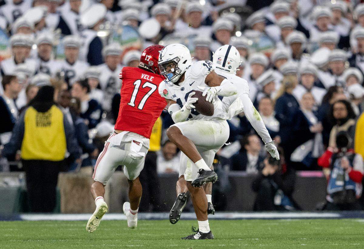 Penn State safety Ji’Ayir Brown intercepts the ball meant for Utah’s Devaughn Vale during the Rose Bowl game on Monday, Jan. 2, 2023.
