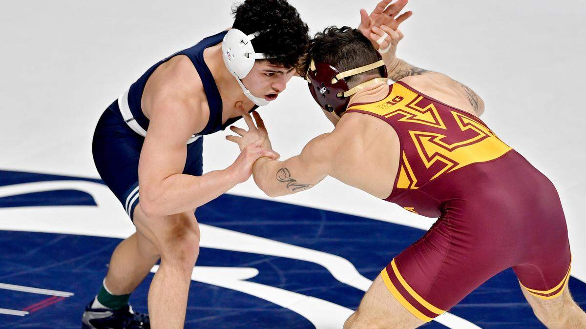Penn State’s Beau Bartlett reaches for Minnesota’s Michael Blockhus in a 149 lb first round bout of the 2021 Big Ten Wrestling Championships at the Bryce Jordan Center on Saturday, March 6, 2021.