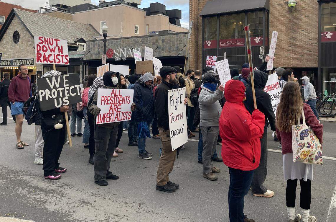 A group of about 50 Penn State student protesters marched in the streets in downtown State College on Tuesday evening after meeting at the Allen Street Gates.