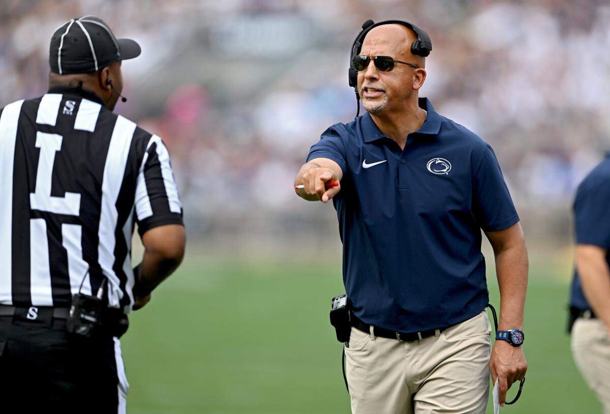 Penn State football coach James Franklin argues a call with the referee during the first quarter of the game against Delaware on Saturday, Sept. 9, 2023.