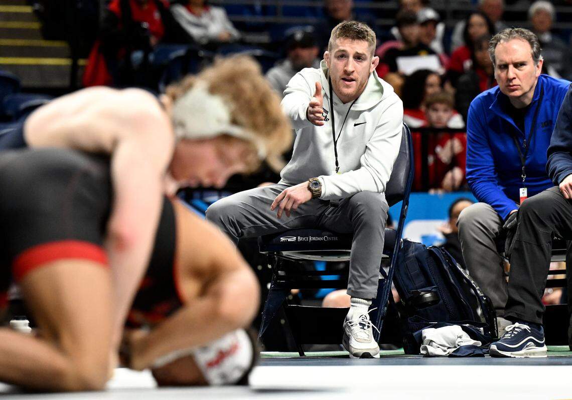 Nick Lee yells to Penn State's Braeden Davis during his 141-pound bout Big Ten wrestling championships on Saturday, March 7, 2026 at the Bryce Jordan Center. 