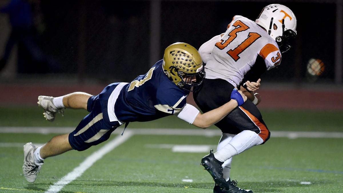 Bald Eagle Area’s Kael Gardner pulls down Tyrone’s Zac Albright during the Friday, Sept. 28, 2018 game.