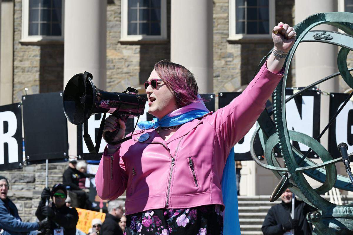 Michel Lee Garrett speaks to thousands of people gathered on Old Main lawn for the No Kings anti-Trump rally on Saturday.
