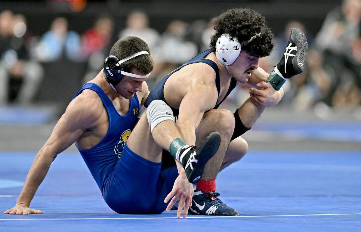 Penn State’s Beau Bartlett wrestles SDSU’s Julian Tagg in a 141 lb bout during the 2025 NCAA Wrestling Championships in Philadelphia on Thursday, March 20, 2025.