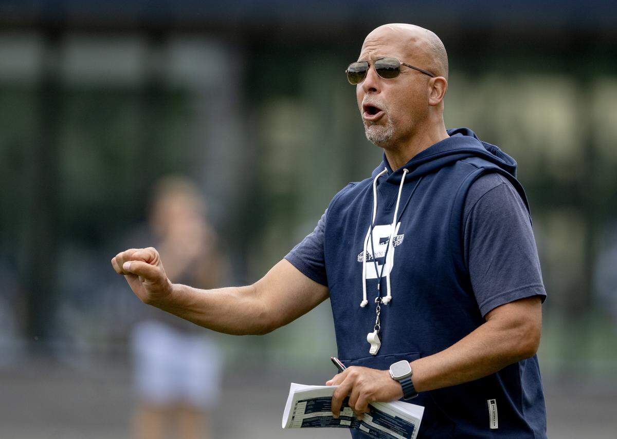 Penn State football coach James Franklin yells to players during practice on Tuesday, Aug. 19, 2025.  