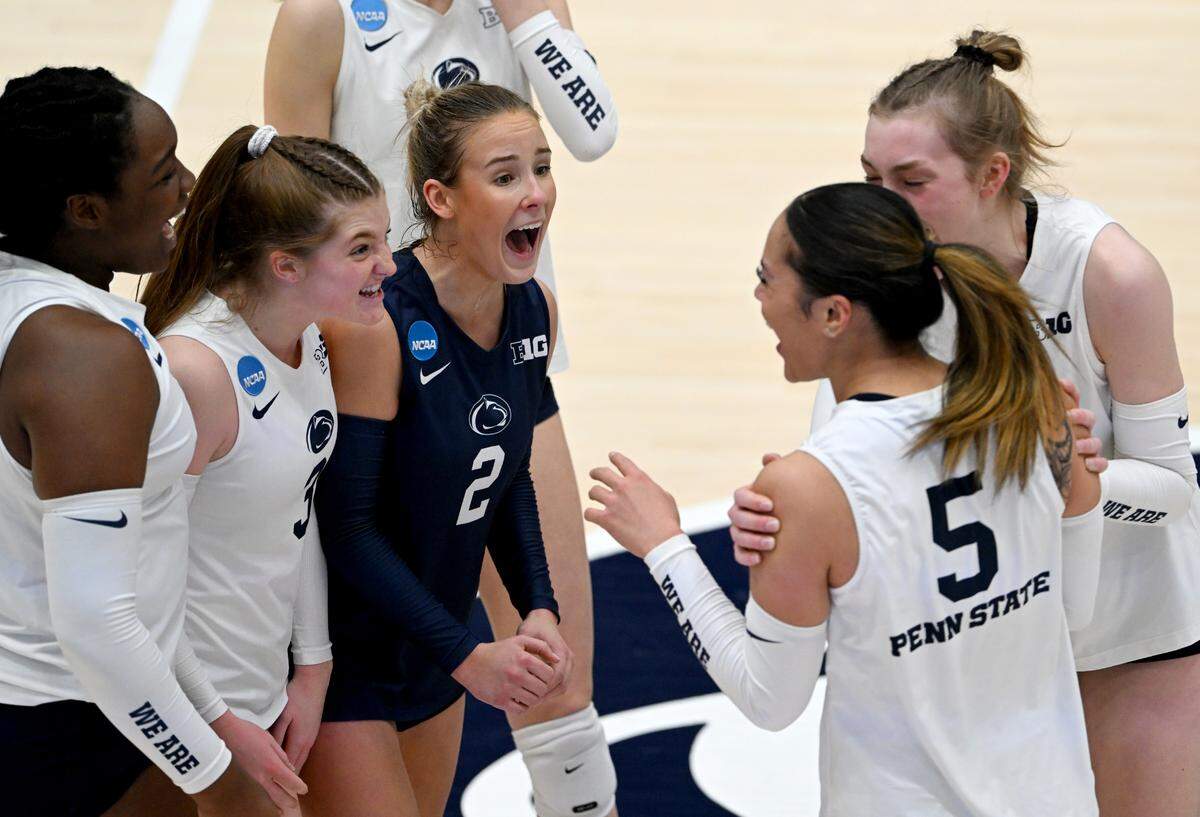 Penn State players celebrate a point from Seleisa Elisaia during the game against UMBC in the first round of the NCAA tournament on Friday, Dec. 2, 2022 in Rec Hall.